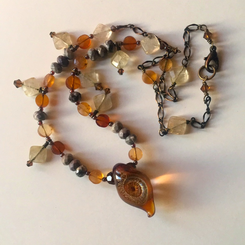 Stone necklace, not sure what they’re called.